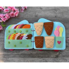 an ice cream sandwich is decorated with felt