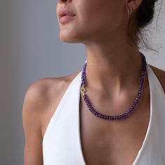 Stunning AAA perfect faceted Amethyst gemstones are hand knotted on a complimentary purple silk cord.  The necklace is finished off with a 14k solid gold clasp which is ideal for adding a charm if you like. This necklace stacks geat with your other favorite necklaces. Detail: ✦ AAA faceted Amethyst gemstones 8mm ✦ 14k solid gold clasp ✦ Hand knotted with silk cord ✦ Measures - choose your length (pictured is an 18 inch necklace) ✦ Packaged in our signature Vivien Frank Black box ready for gift g Elegant Amethyst Round Bead Necklaces, Elegant Necklaces With Round Amethyst Beads, Elegant Amethyst Necklaces With Round Beads, Luxury Purple Necklace With Gemstone Beads, Elegant Amethyst Gemstone Bead Necklaces, Elegant Amethyst Gemstone Beads Necklace, Elegant Purple Faceted Beads Gemstones, Elegant Single Strand Amethyst Beaded Necklace, Elegant Lavender Amethyst Crystal Necklaces