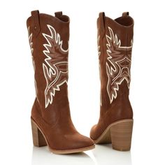 The MIA Taley boots have that classic western embroidery to keep you feeling fashionable and on trend. Made of easy to clean faux leather, this boot will be looking great for years to come. A memory foam insole offers maximum comfort for all-day wear so these boots really are made for walkin'. Western Style Faux Leather Moto Boots For Fall, Cream Western Boots For Fall, Round Toe Knee-high Boots For Western-themed Events In Spring, Knee-high Round Toe Boots For Western-themed Events In Spring, Round Toe Heeled Boots For Rodeo In Fall, Fall Round Toe Heeled Boots For Rodeo, Stacked Heel Boots For Western-themed Fall Events, Round Toe Heeled Boots For Fall Rodeo, Knee-high Boots With Round Toe For Western-themed Spring Events