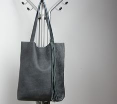 Dark gray leather tote, High leather purse, Laptop Tote bag, Soft leather bag, Women bag, handbag, Tote bag leather, Tote woman Dimensions: height: 15in /38cm max width: 13.4in /34cm width at the bottom: 11in /28cm depth: 3.1in /8cm strap: 23.6in /60cm The tote bag is made from high quality genuine leather. Woman tote bag. Bag tote made with great care and love of Italian leather Been designed to be worn in all case. Italian soft leather Details: * Soft genuine leather * Fits a laptop (up to 15 Gray Leather Shoulder Bag For Everyday Use, Gray Leather Bag For Everyday Use, Gray Leather Bag, Gray Leather Shoulder Bag For Daily Use, Everyday Gray Soft Leather Bag, Gray Soft Leather Shoulder Bag For Daily Use, Gray Soft Leather Bag For Everyday, Gray Leather Rectangular Shoulder Bag, Gray Soft Leather Rectangular Shoulder Bag