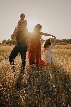 family of four standing in beach grass with sun rays Outdoor Family Photography, Family Picture Poses, Photography Poses Family