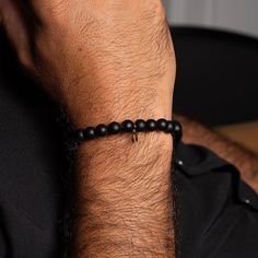 Discover the perfect blend of elegance, meaning, and craftsmanship with our Men's Beaded Bracelet featuring Matte Black Onyx, 14k Solid Gold Beads, and a 14k Solid Gold Wishbone Charm. At Clark & Taft, I believe in creating pieces that not only enhance your style but also carry profound significance. Designed for the Discerning Gentleman: Ideal for the modern man who values sophistication and depth, this bracelet makes an exquisite gift for your dad, husband, brother, any special man in your lif Elegant Hand-strung Bracelets, Classic Black Beaded Bracelets, Classic Black Beaded Bracelets For Formal Occasions, Classic Black Beads Bracelet As Gift, Classic Black Beaded Bracelets For Gift, Luxury Black Hand-strung Beaded Bracelets, Gold Beaded Bracelet, Gold Bead Bracelets, Mens Beaded Bracelets