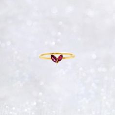 The marquise-cut garnet ring is designed to resemble both a butterfly and a heart, inspired by the delicate beauty of a flower Each garnet stone is cut in a marquise shape and set at a slight angle, creating an effect like petals, giving it a graceful and elegant appearance. [Made to Order] * Metal: 925 Sterling Silver  Choice of Gold Color: Sterling Silver, 18K Rose Gold Vermeil, 18K Yellow Gold Vermeil Main Stone:  Rhodolite Garnet, Marquise Cut, 4x2 mm, 1 pc Rhodolite Garnet, Marquise Cut, 5x Red Marquise Birthstone Ring For Gift, Red Marquise Cut Birthstone Ring Gift, Valentine's Day Birthstone Ring In Fine Jewelry Style, Valentine's Day Ruby Ring Gift, Garnet Marquise Cut Jewelry Gift, Marquise Garnet Ring As Gift, Ruby Heart Ring Fine Jewelry Gift, Marquise Cut Garnet Jewelry Gift, Gift Marquise Cut Ruby Ring Fine Jewelry