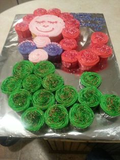 an image of a cake made to look like a pig with green icing on it