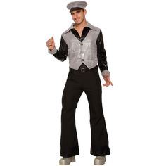 a man dressed in a disco outfit and hat