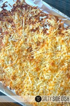 a casserole dish with cheese and other toppings on it in a pan