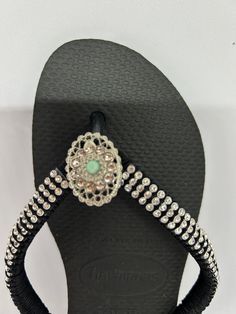 Perfect for Summer Walk at the beach with a pair of comfy & cute flip flops, great for pool and walks  Made with Cristals and a satin lace its super confortable This is Havaianas brand  Size 7 Color Black Size 7/8. Can be made in different colors and sizes. Smoke and pet free Adjustable Non-slip Flip Flops For Beach Season, Bling Open Toe Sandals For Beach, Silver Round Toe Flip Flops For Vacation, Adjustable Non-slip Flip Flops For The Beach, Silver Flip Flops For The Beach, Silver Open Toe Flip Flops For Beach, Silver Open Toe Flip Flops With Rhinestones, Silver Rhinestone Open Toe Flip Flops, Embellished Flip Flops With Round Toe For Beach