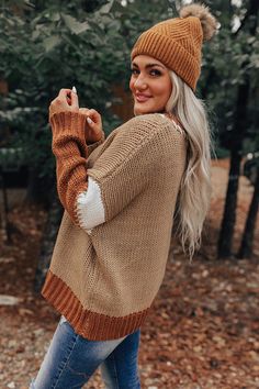 - Your style is as sweet as sugar with this cozy sweater! - Unlined knit material featuring white and brown hues - A crew cut neckline with accent stitching - Long, loose sleeves with accent stitching and ribbed cuffs - A relaxed silhouette that ends in a straight hemline with a ribbed texture Crew Cut, Loose Sleeves, Crew Cuts, Ribbed Texture, Cozy Sweater, Brown Sweater, Women Clothing Boutique, Knitting Materials, Cozy Sweaters