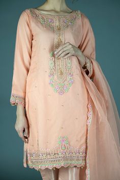 Peach Embroidered Organza (3pc) This peach ensemble is perfect for any spring/summer occasion, cut from hand dyed organza and decorated with intricate floral embroidery and embellishments. Paired with matching trousers in Heritage’s signature cut and elegantly draped with a matching organza dupatta to complete the look. Color may vary slightly due to dyeing process. TOP: OrganzaTROUSER: SilkDUPATTA: OrganzaSIZE & FIT:Model Height: 5' Feet 8" InchModel Wears: S Matching Embroidery, Embroidered Organza, Desi Wedding, Organza Dupatta, Silk Dupatta, Heritage Collection, Dyeing Process, Indian Style, Floral Embroidery