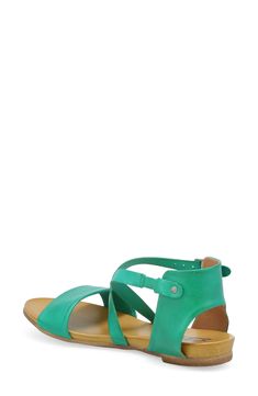 Buttery soft leather straps secure your foot in a contemporary sandal fitted with a cushy footbed for effortless, all-day wear. 1" heel (size 8.5) 3" strap height Adjustable strap with buckle closure Cushioned footbed Leather upper and lining/synthetic sole Made in Portugal Women's Shoes Green Leather Wedge Sandals For Vacation, Green Leather Footbed Sandals With Cushioned Footbed, Green Leather Footbed Sandals For Beach, Green Leather Footbed Sandals, Green Leather Footbed Sandals Casual Style, Green Leather Open Toe Footbed Sandals, Adjustable T-strap Sandals With Leather Footbed For Vacation, Leather Double Strap Wedge Sandals For Spring, Green Leather Casual Footbed Sandals