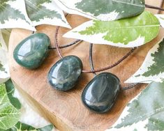 "Stability * Grounding * Nature Energy Beautiful, drilled and polished gemstone pendants in an oval shape. These moss agate pendants are beautifully smooth and shiny, without sharp edges. Due to the simple minimalist appearance, this pendant fits with any outfit. The pendant is unisex and also suitable for children. You can choose whether you want a leather cord in brown or black. The pendant comes in a bag with a crystal card with the spiritual properties of the stone. Once you wear a gemstone Oval Agate Necklace For Healing, Oval Moss Agate Necklaces With Natural Stones, Gemstone Pendants, Love Energy, Agate Pendant, Gemstone Healing, Moss Agate, Leather Cord, Stone Pendants