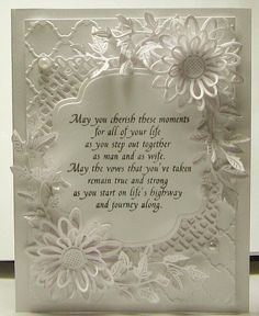 a white card with flowers on it that says may you cherish the moments for all of your life