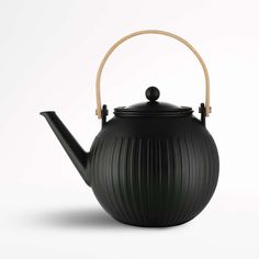 a black teapot with a wooden handle on a white background, it is designed to look like a pleated ball