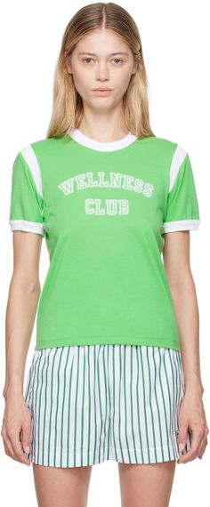 Garment-dyed cotton-blend jersey T-shirt. · Pre-shrunk · Rib knit crewneck, armscyes, and cuffs · Text flocked at chest · Cropped hem · Logo printed at back collar Supplier color: Verde Wellness Club, Rich Green, Sporty And Rich, Knit Crewneck, Jersey T Shirt, Apparel Accessories, Rib Knit, Cotton Blend, Womens Tops