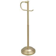 a gold metal toilet paper holder with an umbrella on the top and a white background