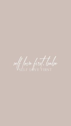 the words self love first written in white ink on a gray background with an image of a