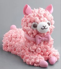 a stuffed animal made out of pink flowers