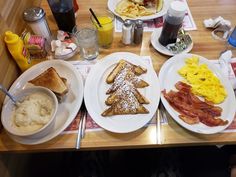 the breakfast is ready to be eaten on the table at the diner's restaurant