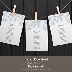 three wedding seating cards hanging from clothes pins on a string with the words instant printable