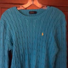 Blue Ralph Lauren Cable Knit Sweater. Size Large. Excellent Condition, Never Worn. Super Comfortable Sweater And Very Warm! Casual Long Sleeve Blue Sweater, Blue Long Sleeve Casual Sweater, Casual Blue Long Sleeve Sweater, Blue Soft Knit Crew Neck Sweater, Blue Ralph Lauren Winter Sweater, Ralph Lauren Blue Winter Sweater, Ralph Lauren Cable Knit Sweater For Fall, Blue Cable Knit Sweater With Crew Neck, Light Blue Crew Neck Knitted Sweater