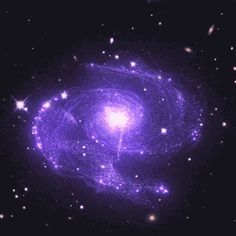 an image of a spiral galaxy in the night sky