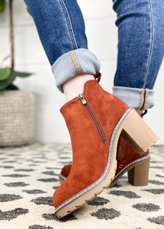 Step up your fall footwear game with the Corkys Bite Me Bootie, where comfort meets effortless style. This versatile bootie is designed with thoughtful details that make it a must-have for any wardrobe. Key Features: Faux Suede Upper: The luxe faux suede upper gives these booties a soft, sophisticated look that’s perfect for any outfit. Easy-On Design: Featuring a heel loop for easy slip-on, a side zipper for quick access, and an elastic panel for flexibility and comfort, these booties are as fu Fall Footwear, Dresses And Tights, Bite Me, 3 Inch Heels, Fall Shoes, Wide Brimmed Hats, Cozy Sweaters, Step Up, Evening Wear