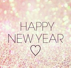 the words happy new year are written in black on a pink and gold glitter background