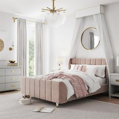 a bedroom with a bed, dressers and mirror in it's center area