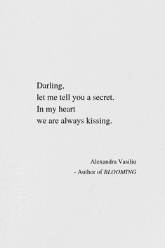 a white wall with a quote on it that says, daring let me tell you a secret in my heart we are always kissing