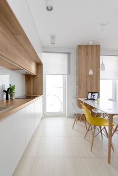 the kitchen is clean and ready to be used for dining or living room purposess