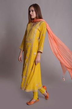 Mustard kurta with floral gota hand embroidered motifs. Paired with churidar and silk tassel dupatta.
Component: 3
Embroidered
Neckine: Notched
Sleeve Length: Three quarter
Fabric: Silk Chanderi 
Color: Yellow
Kasab work
Silk dupatta - Aza Fashions Tassel Dupatta, Kurta Set For Women, Embroidered Motifs, Yellow Silk, Luxury Sale, Silk Dupatta, Fabric Silk, Churidar, Kurta Set