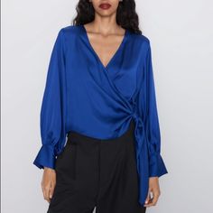 Genuine Zara New With Tag Color: Blue Beautiful Jewel Blue Color Love Buttoned Cuffs And V Neckline Wrap Style. Wear For Work And Happy Hour Afterwards Satin Wrap Blouse, Shirt Blouses Women's, Zara New, Chic Sweaters, Round Neck Dresses, Wrap Blouse, Women Shirts Blouse, V Neck Blouse, Zara Women