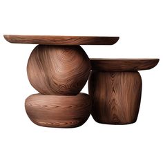 three wooden stools stacked on top of each other