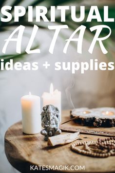 a wooden table topped with candles and other items