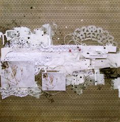 altered photograph of lace and paper on fabric with other items attached to the side of it