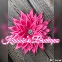 This is a beautiful hand made pink kanzashi flower brooch. The flower is made out of satin fabric and has a pink jewel embellishment in the middle. It measures at 8 inches. It is sitting on felt and placed on a bar pin. This flower brooch is great for any occasion and will add that special something to any outfit. This brooch would be great for weddings, church and makes a great gift. This item ships in 3 to 5 business day. Contact me with special orders. Corsage Pink, Pink Brooch, Brooch Dress, Flower Bouquet Diy, Pink Jewels, Kanzashi Flowers, Ribbon Flower, Satin Flowers, Diy Bouquet