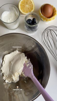 the ingredients to make blueberry cheesecake are in bowls