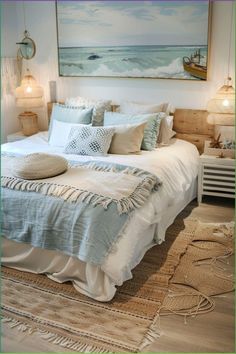 a bed with white linens and pillows in a bedroom next to a painting on the wall