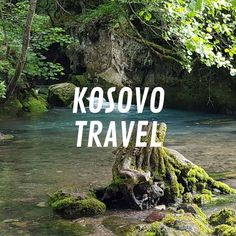 the words kosovo travel are overlaid by mossy rocks and water in a stream