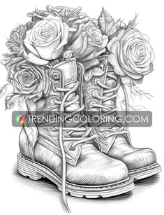 a pair of boots with roses on the inside and laces around them, in black and white