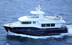 a large white and blue boat in the ocean