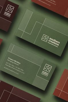 business cards designed to look like tennis court with red and green squares in the background