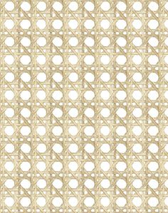 a close up view of a woven fabric with circles and lines on the side, in beige