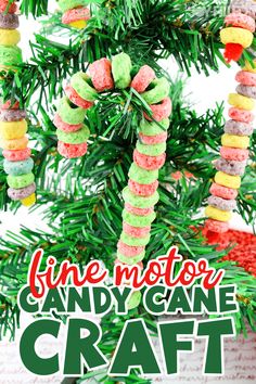 candy cane christmas tree ornament made out of marshmallows and pine cones