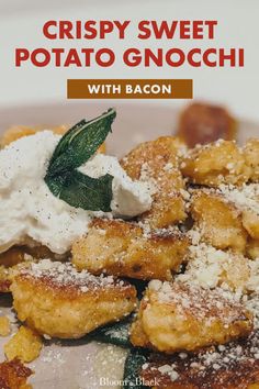 crispy sweet potato gnocchi with bacon on a white plate topped with whipped cream