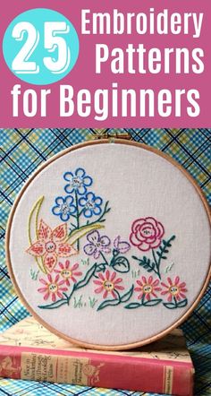 the 25 embroidery patterns for beginners are on top of some books, and there is a