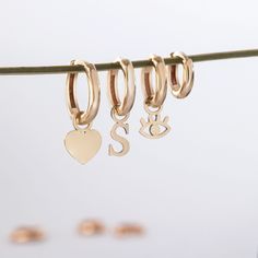 14K 18K Solid Gold Small Tiny Charms, Dainty Everyday Gold Figures For Hoop Earrings, Custom Handmade Charms, Cute Gift For Her We can add these charms to our hoop earrings model your purchased from us. Material: Solid Gold (not gold filled or gold plated) Karat: 14 K (585) 18 K (750) Available gold color: Yellow, rose and white gold M o r e * F r o m * U s Goldstore Jewelry - https://etsy.me/3gHtcrZ * Urn Necklaces - https://etsy.me/2Asb4BM * Bar Necklaces - https://etsy.me/2MhoVxO * Name Neckl Huggie Charm Earrings For Anniversary, Charm Huggie Earrings For Anniversary, Huggie Earrings With Charms For Anniversary, Hoop Earrings With Charms As Gift, Charm Hoop Earrings As Gift, Hoop Earrings With Charms For Gift, Charm Hoop Earrings For Gift, Hoop Huggie Earrings With Dangling Charms For Gifts, 14k Gold Hoop Earrings With Charms For Gifts