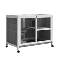 a white and grey cabinet with shelves on wheels