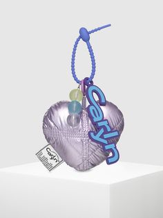 Editor's NoteCARLYN presents unique accessories that exude the brand's one-of-a-kind vibe. - Puffy quilted heart charm- Logo silicone charm- Beads drop charm- Colorful silicon cable tie- Stylish and casual mood Measurements (In.)One Size- Body: 4.72 in. (W) * 8.27 in. (H) * 1.77 in. (D)- Strap: 7.48 in. Composition & Care- Material: Heart Unit: 80% Nylon, 20% Polyurethane / Metal / Silicone- Avoid direct heat and moisture- Wipe off moisture and stains with a dry cloth- Natural Theme Keychains, Bag Charms, Heart Brand, Japanese Bag, Crazy Cookies, Grow Bags, Ideal Boyfriend, Diy For Teens, Heart Bag