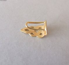 "This is a statement nose ring, inspired by Celtic designs. It's made of yellow gold plated silver. It has a nice matte finish. It hugs the nose and doesn't require a piercing. You slide it on from the bottom of the nose and can tighten it till it fits perfectly. If you wear a Hijab it's the perfect jewel for you, since it can be seen even when you are wearing the Hijab The size of the nose stud that can be seen in the front is - 0..5 \\ 0.8 inches ( 1.3 \\ 2 cm ) This nose ring is \"made to ord Elegant Adjustable Pierced Nose Ring, Fake Nose Piercing, Faux Nose Ring, Nose Cuff, Faux Piercing, Piercing Fake, Piercing Nose, Fake Nose, Nose Jewelry